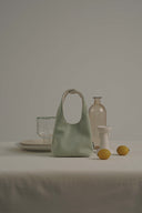 (Mint Green)TENERA Suede Triangle Double-sided Pouch